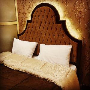 Heritage Hostel Cairo tesisinde bir odada yatak veya yataklar