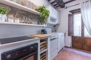 Virtuvė arba virtuvėlė apgyvendinimo įstaigoje Villa Biancospino