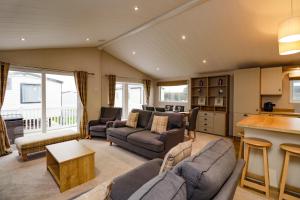 Χώρος καθιστικού στο 2 bedroom Lodge at Pevensey Bay