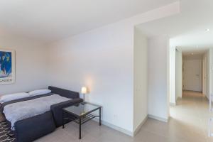 Posteľ alebo postele v izbe v ubytovaní Apartamento Las Canteras Beachway