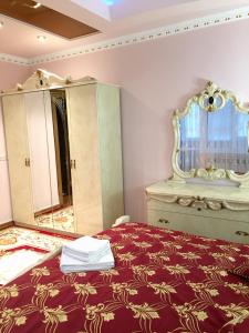 Postel nebo postele na pokoji v ubytování Петрос Family Hotel