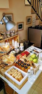 a table with many different types of food on it at La City Mercado in Alicante