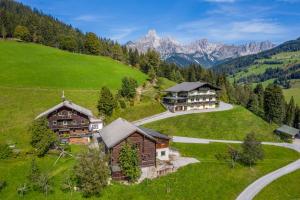 an aerial view of a resort in the mountains at Haus Kleinberg in Filzmoos