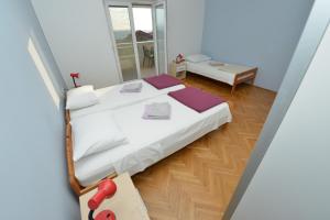 Postel nebo postele na pokoji v ubytování Villa Medic