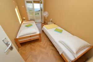 Postel nebo postele na pokoji v ubytování Villa Medic
