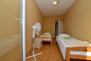 Postel nebo postele na pokoji v ubytování Villa Medic