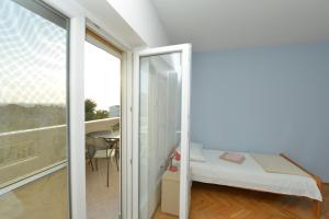 Postel nebo postele na pokoji v ubytování Villa Medic