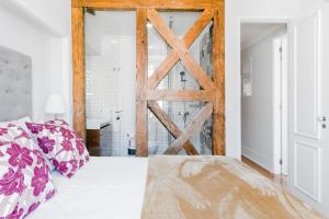 Cama o camas de una habitación en Lisbon Center V