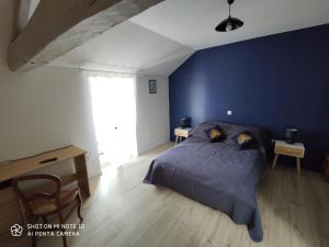 Postel nebo postele na pokoji v ubytování GITE DE MONTRANCON