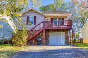 a house with a staircase on top of it at Rock of Ages in Pigeon Forge