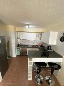 Η κουζίνα ή μικρή κουζίνα στο Condominio portal pacifico II