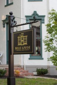 a sign for a beta house in front of a house at Belle Louise Historic Bed & Breakfast in Paducah