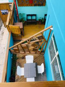 an overhead view of a deck with a table and chairs at El Navegante de Culebra in Culebra