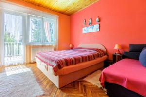 Posteľ alebo postele v izbe v ubytovaní Apartments SENKA