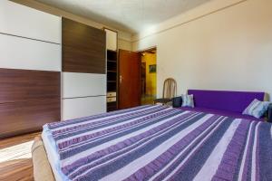 Posteľ alebo postele v izbe v ubytovaní Apartments SENKA