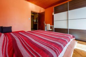Posteľ alebo postele v izbe v ubytovaní Apartments SENKA