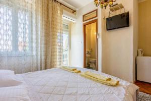 Postel nebo postele na pokoji v ubytování Rooms CICO