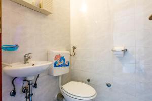 Koupelna v ubytování Rooms CICO
