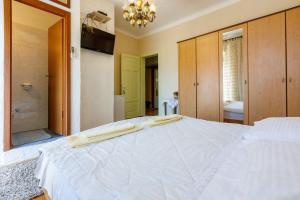 Postel nebo postele na pokoji v ubytování Rooms CICO