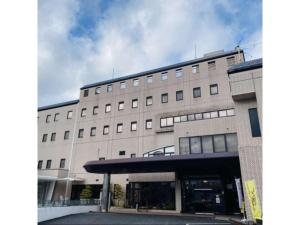 a large white building with a lot of windows at Shobara Grand Hotel - Vacation STAY 06902v in Shōbara