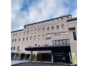 a large white building with a lot of windows at Shobara Grand Hotel - Vacation STAY 06886v in Shōbara