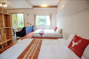 Postel nebo postele na pokoji v ubytování Deer Crossing B&B
