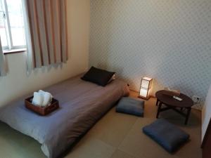Katil atau katil-katil dalam bilik di B&B YUIGAHAMA