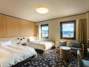 Maizuru Grand Hotel客房内的一张或多张床位