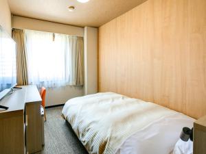 Maizuru Grand Hotel客房内的一张或多张床位