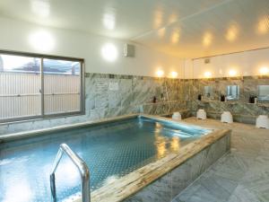 Bazén v ubytování Maizuru Grand Hotel nebo v jeho okolí