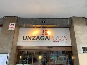 a sign on the front of a building at Hotel Unzaga Plaza in Éibar