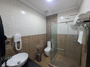 Koupelna v ubytování Indico Executivo Hotel
