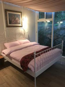 Letto o letti in una camera di Yun Ting Orchid Garden