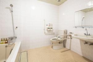 Baðherbergi á HOTEL MYSTAYS Kanda