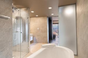Vannituba majutusasutuses aDLERS Hotel Innsbruck
