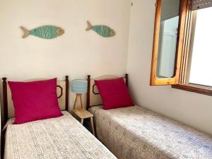 Posteľ alebo postele v izbe v ubytovaní Casa del Faro By Cala Salento