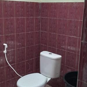Ванна кімната в Mimi Guest House Syariah Pangkalan bun