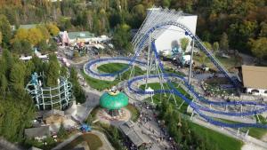 an aerial view of an amusement park with a roller coaster at Chamarel in Pont-Sainte-Marie