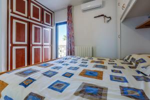 Posteľ alebo postele v izbe v ubytovaní Apartment Eni Selce
