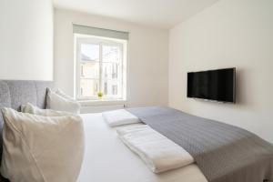 Posteľ alebo postele v izbe v ubytovaní Kaiser Max Design Appartements