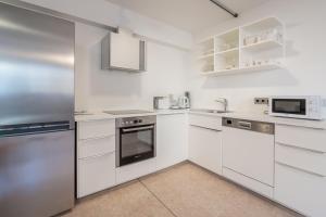 Kuchyňa alebo kuchynka v ubytovaní Kaiser Max Design Appartements
