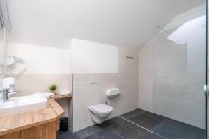 Kúpeľňa v ubytovaní Kaiser Max Design Appartements