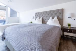 Posteľ alebo postele v izbe v ubytovaní Kaiser Max Design Appartements