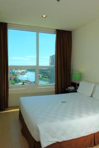 Postel nebo postele na pokoji v ubytování Go Hotels Plus Mandaluyong