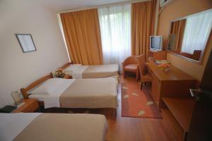 Postel nebo postele na pokoji v ubytování Hotel Srbija-FREE PARKING + 37 fotografií