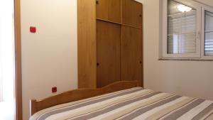 Posteľ alebo postele v izbe v ubytovaní Vodice Family Apartment