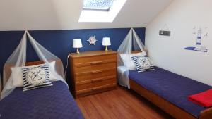 Posteľ alebo postele v izbe v ubytovaní Vodice Family Apartment
