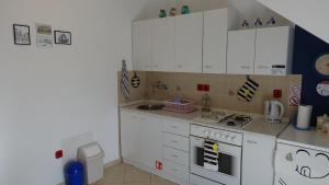 Kuchyňa alebo kuchynka v ubytovaní Vodice Family Apartment