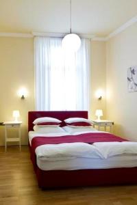 Postel nebo postele na pokoji v ubytování Buchholz Downtown Hotel + 26 fotografií
