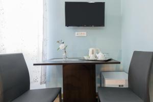 TV a/nebo společenská místnost v ubytování Rooms Lucia